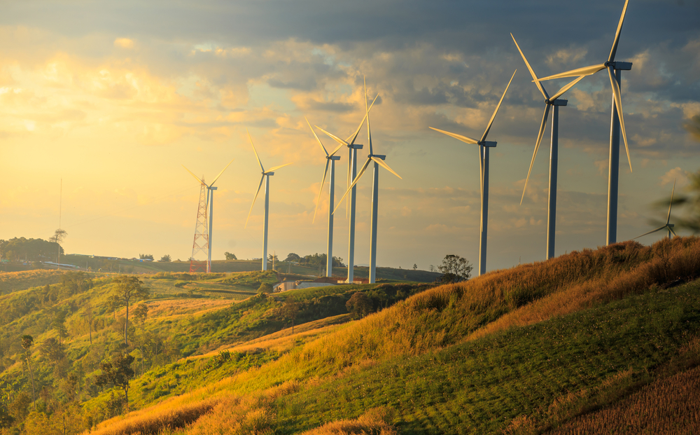 large wind turbines in rural area on a sunny morning